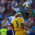 Football players performs during the soccer game