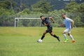 Football players playing soccer in the ground Royalty Free Stock Photo