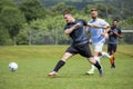 Football players playing soccer in the ground Royalty Free Stock Photo