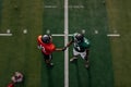 Football players shaking hands after a hard-fought competition