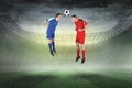 Football players tackling for the ball Royalty Free Stock Photo