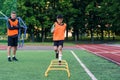Children`s football players during team training before an important match. Exercises for the youth football team. Royalty Free Stock Photo