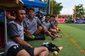 The football referee informs team players about the rules of the game