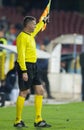 football referee performs during the soccer game