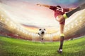 Soccer striker hits the ball with an acrobatic kick. 3D Rendering