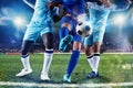 Football scene with competing soccer players at the stadium Royalty Free Stock Photo