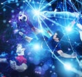 Football scene with soccer player in front of a futuristic digital background