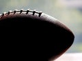 Football in silhouette against window Royalty Free Stock Photo