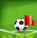 Football (soccer) ball on corner of field and flag Royalty Free Stock Photo