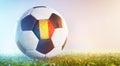 Football soccer ball with flag of Belgium on grass Royalty Free Stock Photo