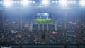 Football Soccer Championship Stadium Match, Scoreboard Screen Showing Repeat of the Goal. Crowd of