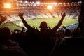 Football, soccer fan support their team and celebrate goal, score, victory. Black silhouette Royalty Free Stock Photo