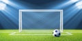 Football (soccer) goals and ball on clean empty gr