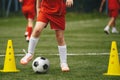 Football soccer kids team exercising with balls. Young athletes during the team training before the match. Young players Royalty Free Stock Photo