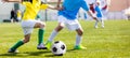 Football soccer match for children. Boys playing football game Royalty Free Stock Photo