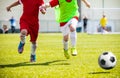 Football soccer match for children. Boys playing football game Royalty Free Stock Photo