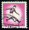 Football soccer player, Ajman stamp circa 1972