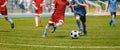 Football Soccer Players Running with Ball. Footballers Kicking Football Match Royalty Free Stock Photo