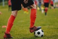 Football Soccer Practice Session. Young Soccer Player in Training with Ball