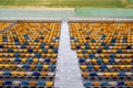 Empty tribune with symmetry colorful plastic seats