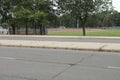 football soccer stadium field track shot from across road street with yellow. p Royalty Free Stock Photo