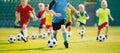 Football soccer training for kids. Young boys improving soccer skills Children football training