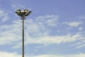 A football stadium floodlight , blue sky Royalty Free Stock Photo