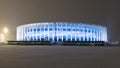 Football stadium in Nizhny Novgorod in the winter. A modern sports facility with night lighting