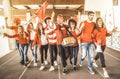 Football supporter fans friends cheering and walking to soccer match Royalty Free Stock Photo