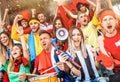 Football supporter fans friends cheering and watching soccer cup Royalty Free Stock Photo
