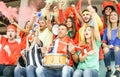 Football supporter fans watching international soccer match - Young group of excited friends having fun exulting at world game Royalty Free Stock Photo