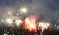 Football Supporters Pasoepati action while supporting his favorite team Persis Solo Royalty Free Stock Photo