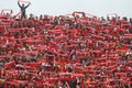 Football Supporters Pasoepati action while supporting his favorite team Persis Solo