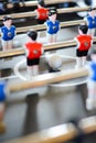 Football table game players suggesting team coaching Royalty Free Stock Photo