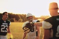 Football team laughing at practice Royalty Free Stock Photo