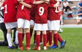 Football Team Standing in Team Circle Before Tournament Final Match Royalty Free Stock Photo