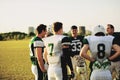 Football team talking together during a practice Royalty Free Stock Photo