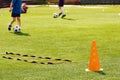 Football Training Field at School Pitch. Children Playing at Soccer Field. Training Ladder and Cone on Grass Turf Royalty Free Stock Photo