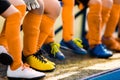 Footballers in soccer cleats. Youth athletes in soccer clothes Royalty Free Stock Photo