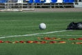 Footballs on the field after training and playing. Without people Royalty Free Stock Photo