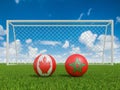 Footballs in flags colors on soccer field. Canada with Morocco. 3d