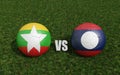 Footballs in flags colors on soccer field. Myanmar with Laos. 3d