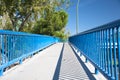 Footbridge with blue railing