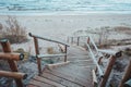 Footbridge over a dune at the beach in Latvia. Royalty Free Stock Photo