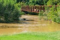 Footbridge Over a Raging Roanoke River Royalty Free Stock Photo