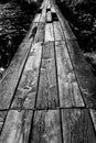 Footbridge over water wooden passage black and white