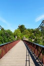 Footbridge in the Parc Buttes-Chaumont - Paris, France Royalty Free Stock Photo