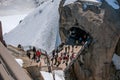 Footbridge with tourists on the Aiguille du Midi in French Alps Royalty Free Stock Photo
