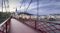 Footbridge and view of old city of Lyon at sunset, France Royalty Free Stock Photo