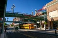 Footbridges to Centro Ybor entrance with yellow tram underneath Royalty Free Stock Photo